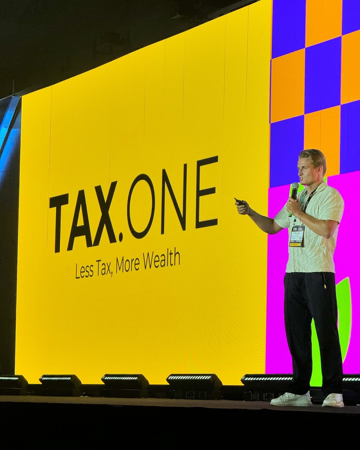 Ricardo Gorski, founder of Tax.One, delivering a main stage speech